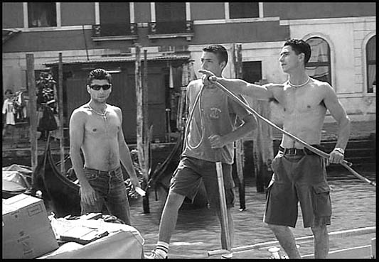 Delivering the morning produce on
                the Grand Canal, Venice